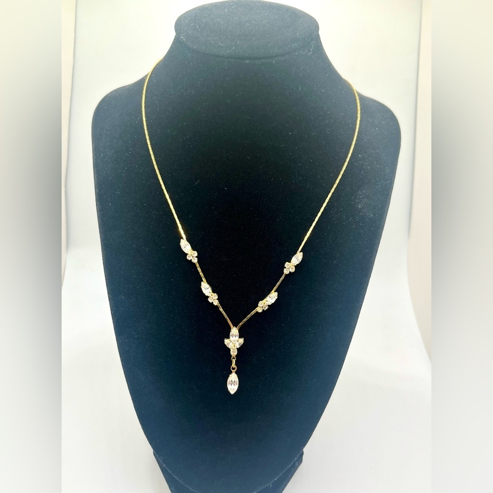 Gold tone Y necklace with crystal drops